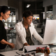 Lila (Emmanuelle Chriqui) and Dr. Sykes (Caroline Chikezie) work frantically on the cure.